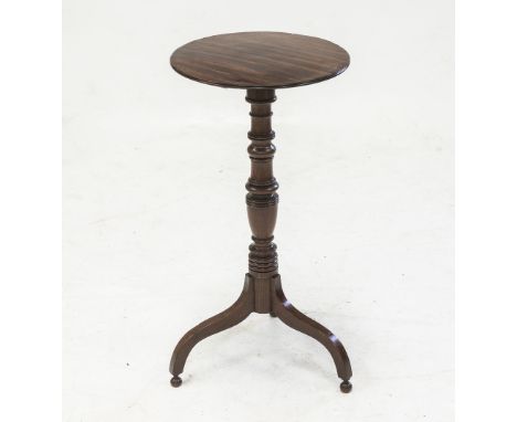 A VICTORIAN MAHOGANY TRIPOD TABLE, the circular top over a turned standard raised on square section down swept legs terminati