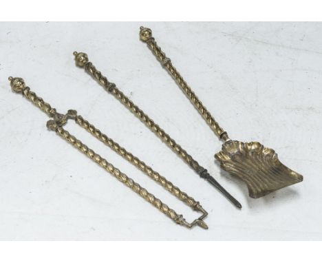 A SET OF THREE 19th CENTURY BRASS FIRE TOOLS, of 'barley twist' design.