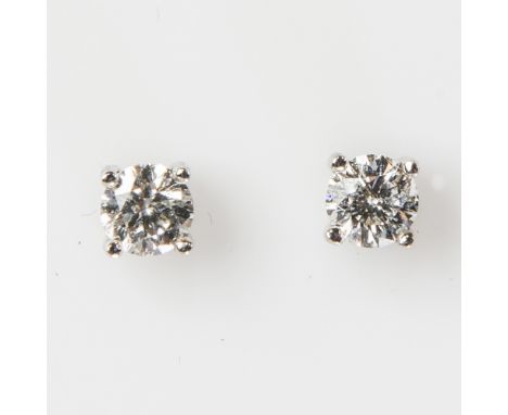 A PAIR OF DIAMOND EAR STUDS, each round brilliant-cut stone claw-set in 18ct white gold, post and butterfly fittings, total d