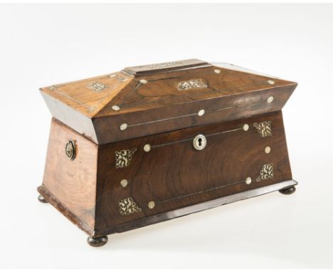 A MOTHER OF PEARL INLAID ROSEWOOD CADDY, c. 1840, of shaped sarcophagus form, with twin removable compartments and an (associ