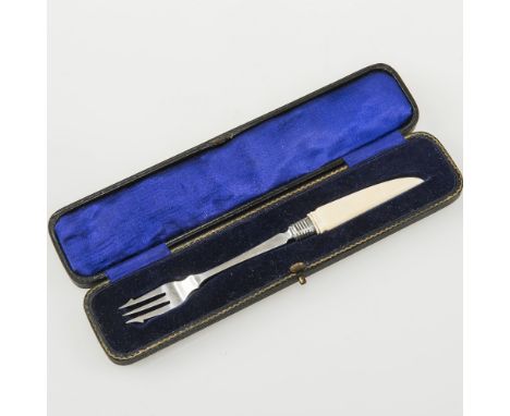 A GEORGE V CASED IVORY-HANDLED SILVER PICKLE FORK, Sheffield 1933. 