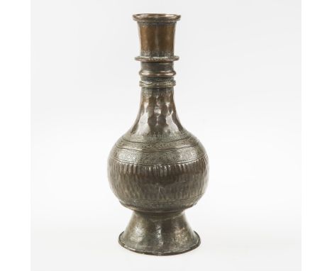 A LATE 17th/EARLY 18th CENTURY PERSIAN BRONZE VASE, with banded engraved and hammered decoration, height 35cm high 