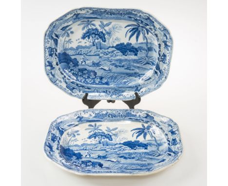 A PAIR OF 19th CENTURY ENGLISH BLUE AND WHITE 'ORIENTAL SPORTS' SERVING DISHES, both decorated with hunting scenes, bearing p