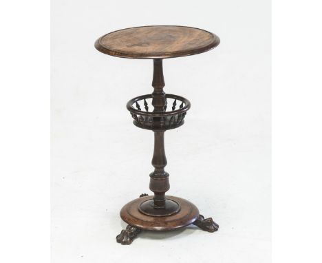 A 19th CENTURY MAHOGANY WINE TABLE, the moulded circular top over a turned standard centred by a galleried shelf with turned 