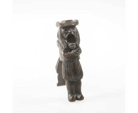 A LATE 19TH CENTURY/EARLY 20TH CENTURY FRENCH CARVED NUTCRACKER MODELLED AS A STANDING BRETON MAN WEARING A HAT AND TRADITION