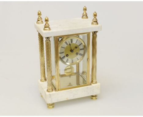 A GILT-BRASS AND MARBLE FOUR-GLASS MANTLE CLOCK, the architectural case with four fluted columns, platform base and acorn fin