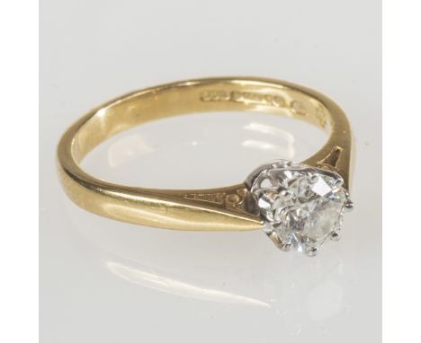 A DIAMOND SOLITAIRE RING, the round brilliant-cut stone weighing approximately 0.53 carats claw set on a tapering 18ct yellow