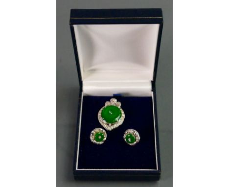 18ct white gold Diamond and Jade pendant with matching earrings:  Pendant measures 28mm high, the earrings for pierced ears m