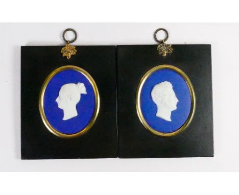 Wedgwood pair of dark blue dipped Jasper portrait medallions: Young Queen Victoria and Prince Albert c1840, both in leather f