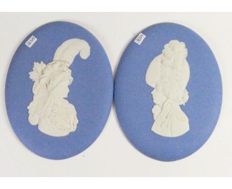 Wedgwood blue portrait plaques of HRH Prince of Wales &amp; HM Queen Caroline: Both dated 1973, height 15.5cm. (2)