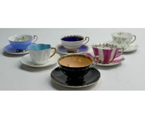 A collection of Shelley Cup and saucers to include: Dainty 14114 Shamrock, Dainty 2003/25 Blue i/s cup - saucer white, Stratf