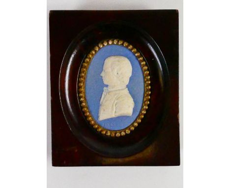 Wedgwood solid blue Jasper portrait medallion of John Flaxman Jnr: Flaxman impressed to front, self portrait of Flaxman aged 