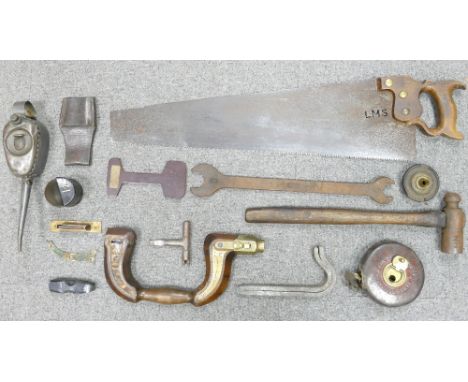 A collection of Railway Engineers hand tools: Including saw &amp; spanner stamped LMS.
