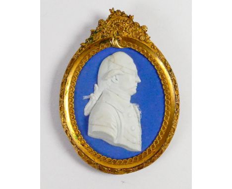 Wedgwood pale blue dipped Jasper portrait medallion of Edmond Burke: Irish Politician c1790 in gilt Ormulo frame, overall h12