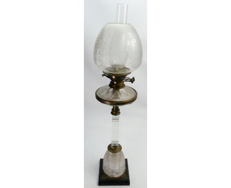Antique cut glass crystal oil lamp: With brass mountings and hinks double burner. Marked F Cobler to base. Height overall 79c