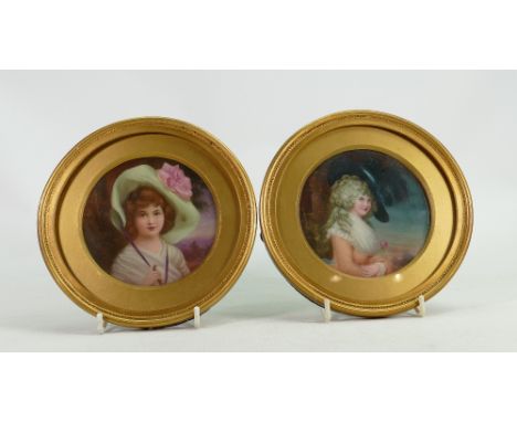 Pair of porcelain portrait plaques by Leslie Johnson: Both hand painted with portraits of ladies in hats in gilt frames by Ro
