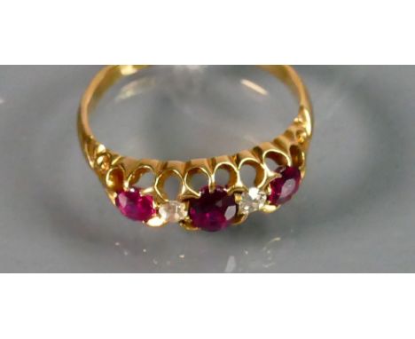 Victorian 18ct gold 3 stone Ruby &amp; Diamond ring: Size K, 2.6g.