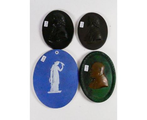 A collection portrait plaques: Height of largest 12.5cm. (4)