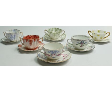 A collection of Shelley Wileman and Co (Foley) Bouillon cups &amp; saucers: Daisy 6196 Blue Trailing flowers, Daisy 6237 Para