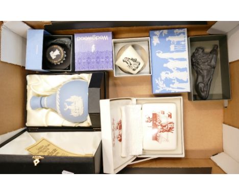 A collection of Wedgwood boxed items to include: Glenfiddich decanter, Basalt lion, Liberty bell paperweight etc.