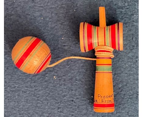 Pelé, from his own personal collection- Unique Wooden Catch Ball. Writing on the bottom reads: Present, From Norihiko Sakurad