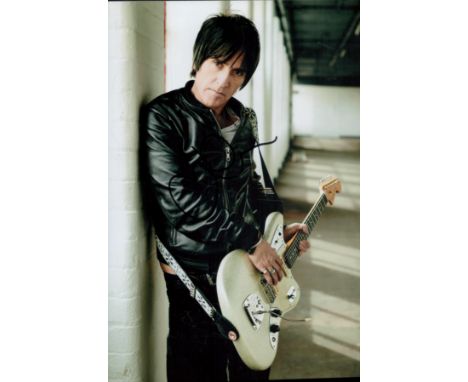 Johnny Marr signed 12x8 inch colour photo. Johnny Marr (born John Martin Maher, 31 October 1963) is an English musician, song