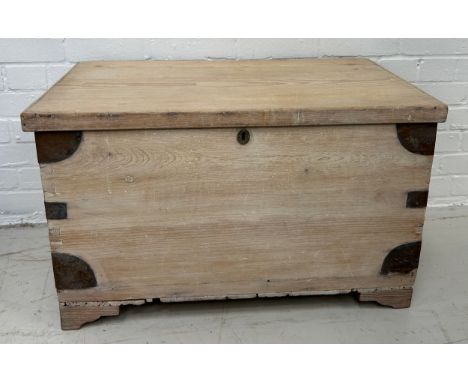 A BLEACHED PINE TRUNK WITH IRON BOUND WITH HANDLES,78cm x 47cm x 45cm 