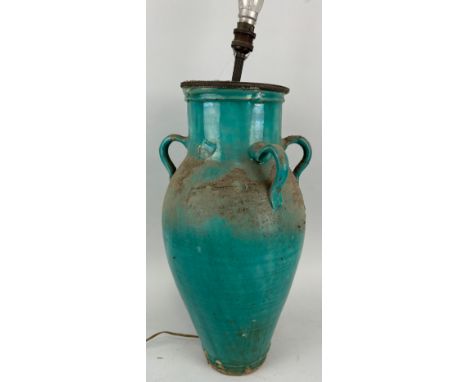 A LARGE BLUE GLAZED CERAMIC JUG WITH FOUR LUG HANDLES, Adapted for a lamp. 51cm x 25cm 
