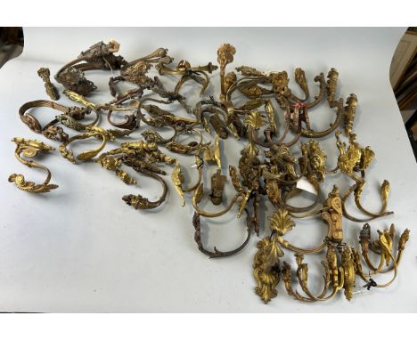 ARCHITECTURAL SALVAGE: A LARGE COLLECTION OF FRENCH ROCOCCO CURTAIN POLE SUPPORTS (QTY)Longest 25cm L 