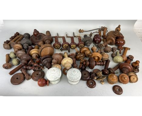 ARCHITECTURAL SALVAGE: A LARGE COLLECTION OF ANTIQUE WOODEN CURTAIN POLE STOPS, ANTIQUE DOOR HANDLES AND OTHER ELEMENTS (FIRS