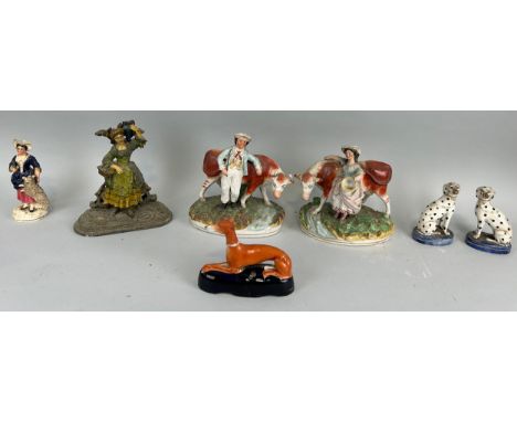 A GROUP OF 19TH CENTURY STAFFORDSHIRE STYLE CERAMIC FIGURES, TO INCLUDE ONE METAL ONE (7) 