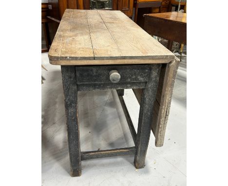 A RUSTIC PINE GATE LEG TABLE WITH EBONISED LEGS,Closed 121cm x 73cm x 50cm Open 121cm x 73cm x 100cm 