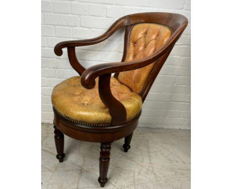 A CAPTAINS SWIVEL CHAIR WITH TAN LEATHER BUTTON BACK UPHOLSTERY,90cm x 65cm x 60cm 