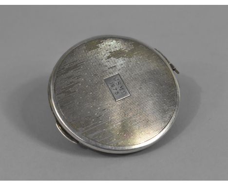 A Silver Powder Compact with Engine Turned Decoration 