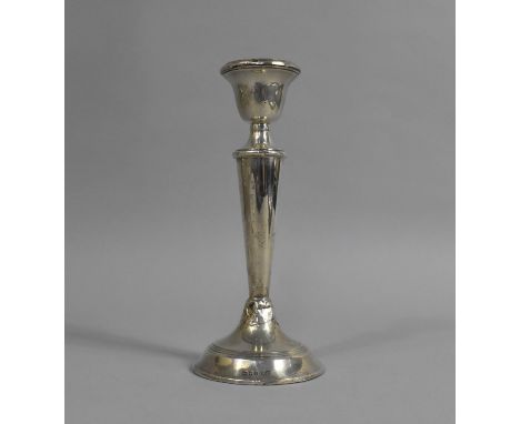 A Silver Candlestick, 18.5cm high, has been Soldered to Base 