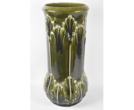 A Continental Green Majolica Glazed Stick Stand with Acanthus Moulded Decoration, 57cms High 