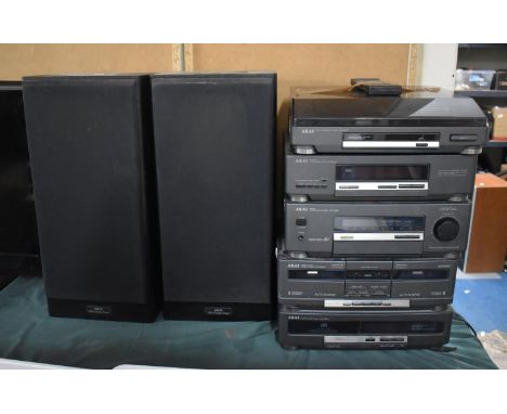 A Collection of Akai Hi-Fi Equipment to Include AP-M600 Turntable, AT-M600 Quartz Synthesizer Tuner, AM-M800 Integrated Ampli