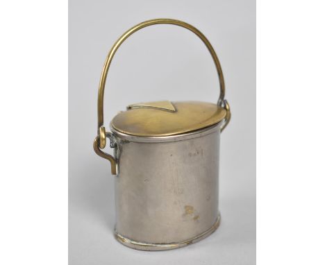 A Novelty Desk Top Inkwell in the Form of an Oval Pail with hinged Brass Lid and Carrying Handle complete with Ceramic Liner,