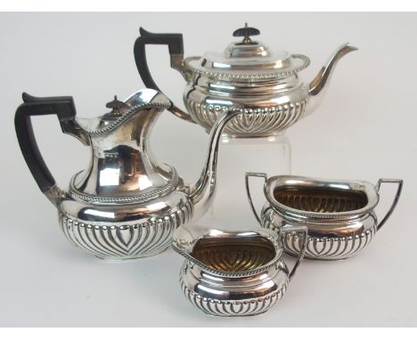 AN EDWARDIAN SILVER TEA &amp; COFFEE SERVICE by W &amp; G Sissons (William &amp; George Sissons) London 1902, of rounded rect