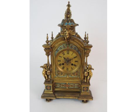 A FRENCH CHAMPLEVE ENAMEL MANTLE CLOCKthe dial with Roman numerals, the movement stamped Gay Vicarino & Co, Paris and numbers