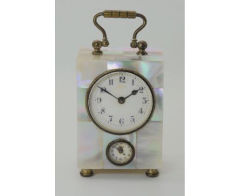 A MOTHER OF PEARL WECKER ALARM CARRIAGE CLOCK stamped D R P &amp; G M, with a regular dial and an alarm dial, mother of pearl