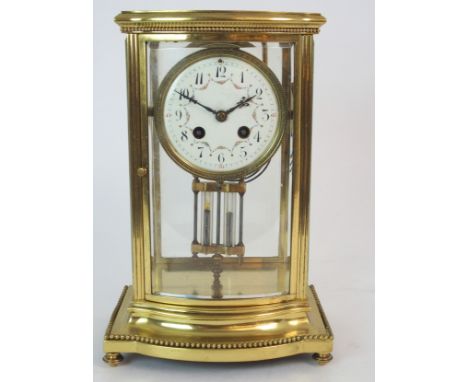 A FRENCH FOUR GLASS AND BRASS MANTLE CLOCK the white enamel dial with arabic numerals and swags of flowers, with mercury fill