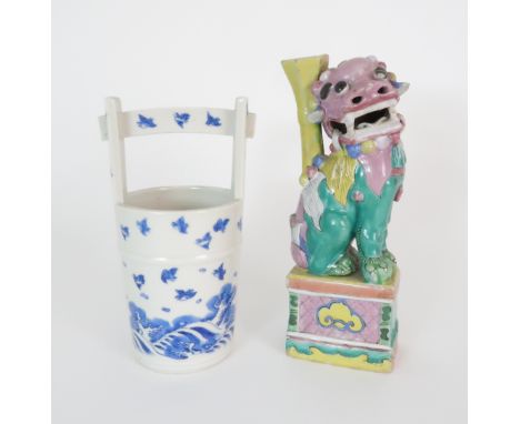 A HIRADO BLUE AND WHITE PAIL painted with birds above a frothing sea, 20cm high and a Chinese joss stick holder, modelled as 