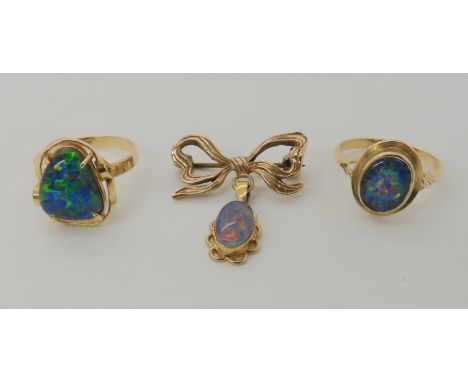 A COLLECTION OF OPAL TRIPLET JEWELLERY a 14ct gold asymmetrical opal triplet ring, finger size N, weight 2.8gms. A 9ct gold o