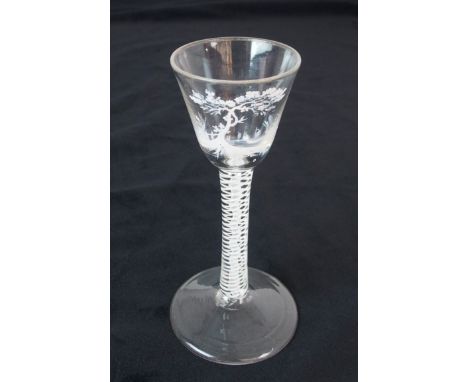 AN 18TH CENTURY BEILBY STYLE AIR TWIST STEM DRINKING GLASS with painted enamel decoration of a tree on a bank with boats in t