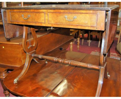 A reproduction figured walnut sofa table having twin frieze drawers, width (leaves down) 91cm