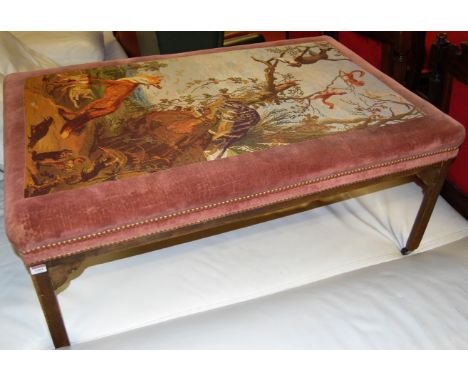 A Georgian style oak framed and tapestry upholstered rectangular footstool of good size, the top depicting hunting scene with