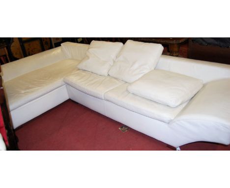 A large contemporary Italian white leather upholstered corner sofa, raised on curved chrome supports, 180 x 340cm
