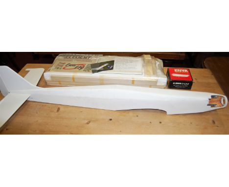 A part complete balsa wood own design semi built kit titled Met 2, sold with an Enya 40 engine and pre-formed under carriage 