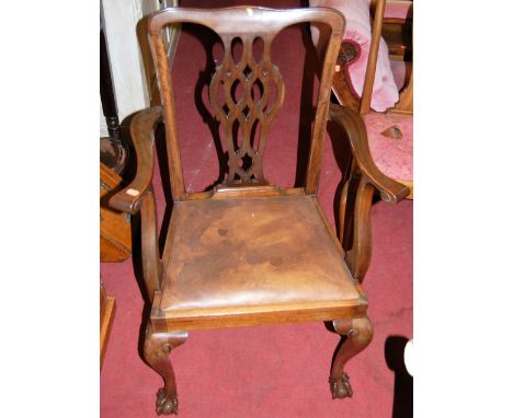 An early 20th century Chippendale style mahogany elbow chair; together with a matching side chair (2)